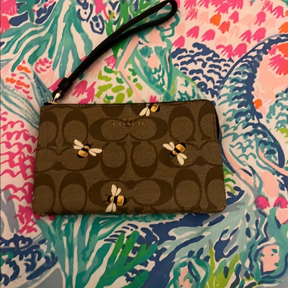 Coach Tan Wristlet with Bee Motif
